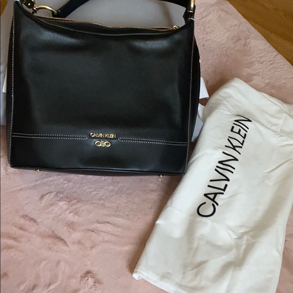 Calvin Klein
Pebble Leather Sophia Hobo Bag - Picture 9 of 13